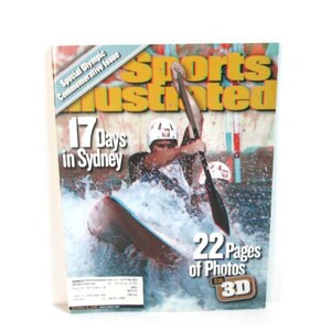 May include: A Sports Illustrated magazine cover featuring a kayaker navigating whitewater rapids. The cover includes text that reads "17 Days in Sydney" and "22 Pages of Photos in 3D". The magazine is a Special Olympic Commemorative Issue.