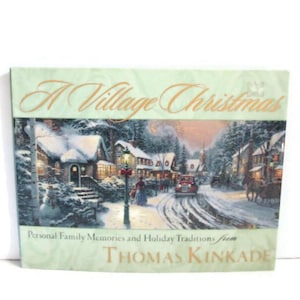 May include: A Village Christmas book cover featuring a winter village scene with snow-covered houses, a red car, and people. The text includes "A Village Christmas" and "Thomas Kinkade".