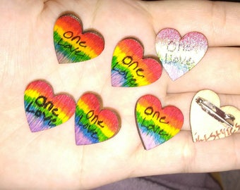 One Love rainbow heart pin.