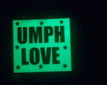 Glow in the dark UMPH LOVE sticker.