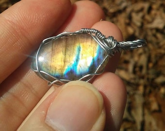 Colorful labradorite wire wrap pendant necklace.