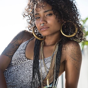 A pair of Gauged Hoop Earrings: Available in Gold or Silver (00 gauge)