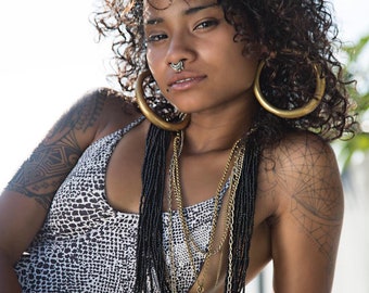 A pair of Gauged Hoop Earrings: Available in Gold or Silver (00 gauge)