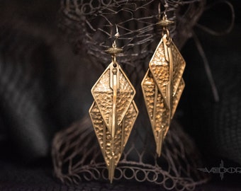 A pair of gold Diamond Triangle Earrings Statement Ear Weighst