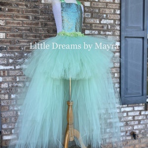 green dress statue of liberty  This gorgeous Statue of Liberty inspired gown and crown is just  perfect for any special occasion! The beautiful details include a super  soft bodice with smocking in the back, flowing ruffles