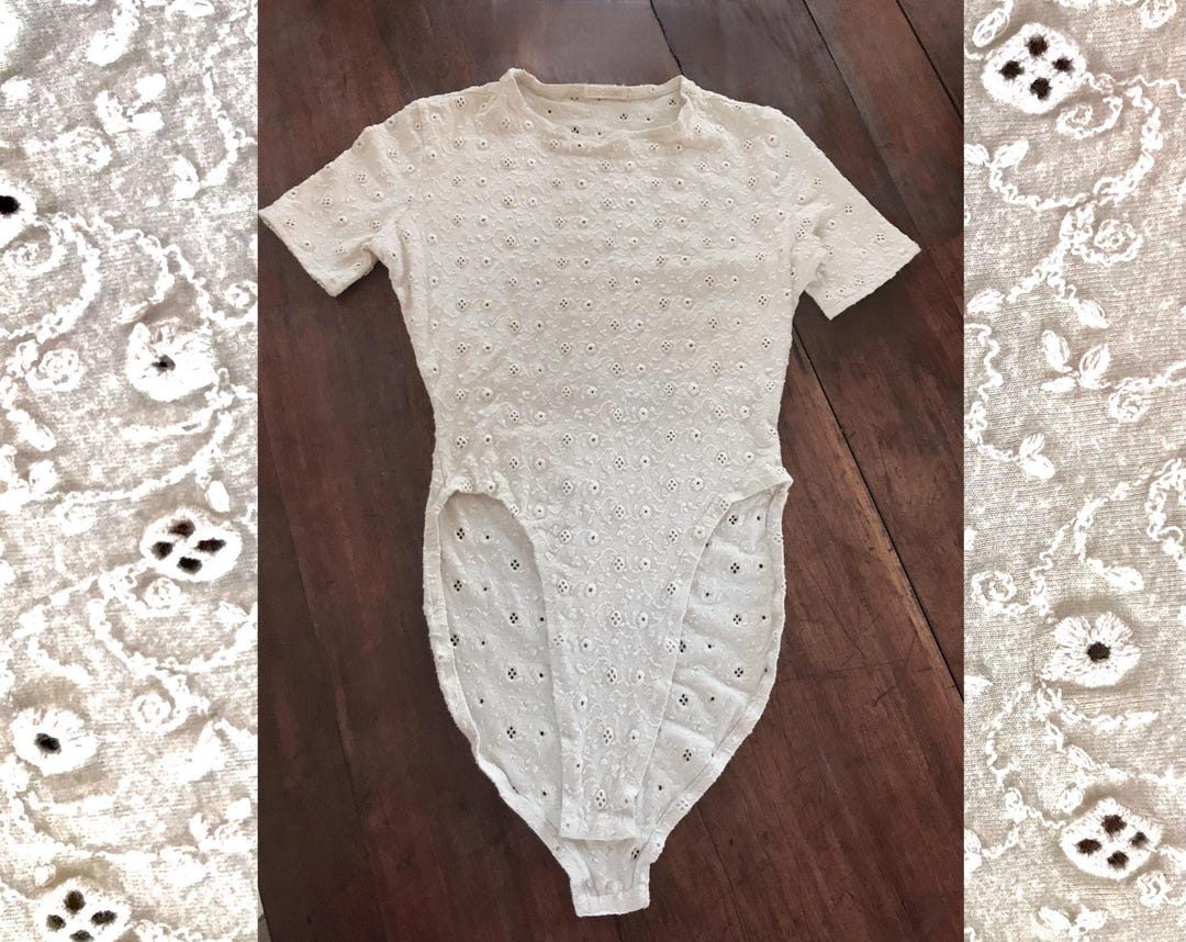 Perfee Tied Eyelet Short Sleeve Bodysuit main image 0