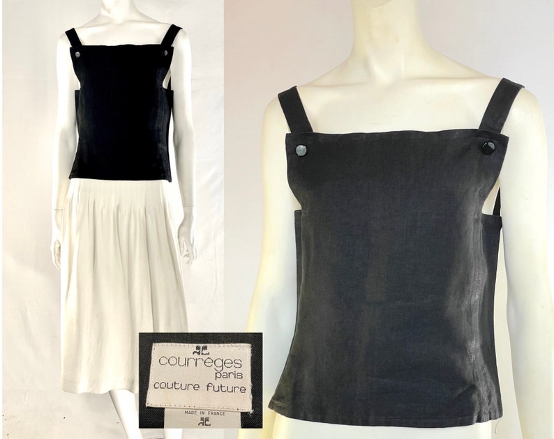 May include: A black sleeveless top with wide shoulder straps and large buttons. The top is paired with a white skirt. The label reads "courr&egrave;ges paris couture future".