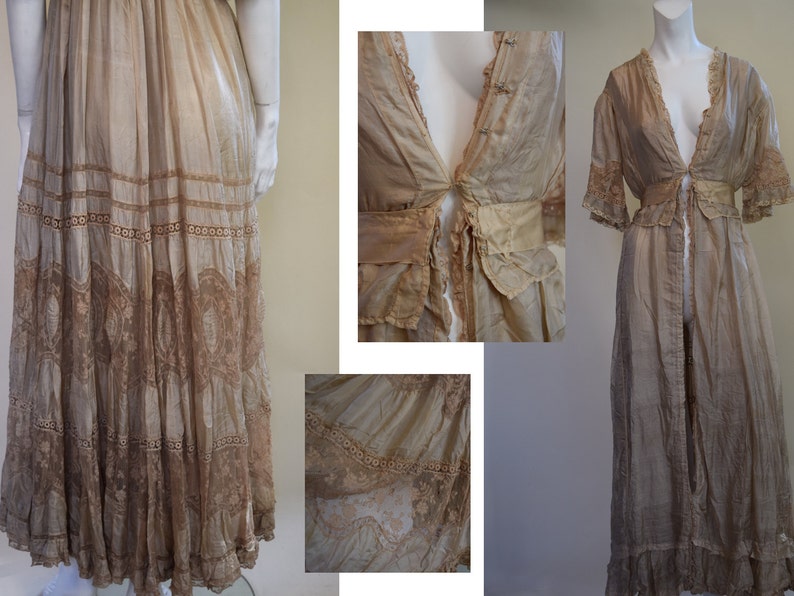 May include: A collection of vintage-style, light brown garments. The ensemble includes a long, tiered skirt with lace detailing, a flowing robe with lace trim, and a close-up of a bodice with delicate buttons and a tie closure. The fabrics appear sheer and lightweight.