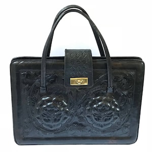 Large Black Handbag with dramatic allover tooled - like embossed design