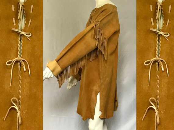 American artifact −  Native American, handmade and fringed suede coat with irregular hemline following the skin shape.