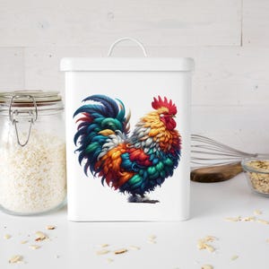 May include: White ceramic canister with a colorful rooster illustration. The rooster has a red comb and wattle, and its feathers are a mix of blue, green, yellow, orange, and red.
