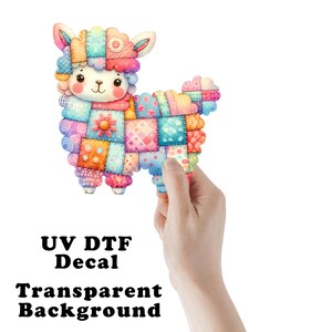 May include: A colorful, patchwork-style llama decal with a transparent background. The llama features a variety of patterned squares in shades of pink, blue, orange, and green. Text on the image reads "UV DTF Decal Transparent Background."