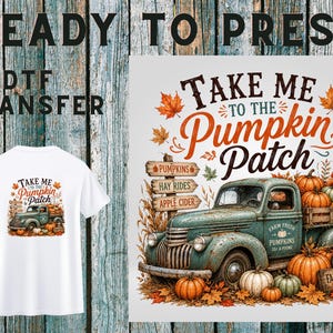 May include: A white t-shirt and a DTF transfer sheet featuring a teal vintage truck loaded with orange pumpkins. The graphic includes the text Take Me To The Pumpkin Patch, a wooden signpost with directions, and autumn leaves on a light background.