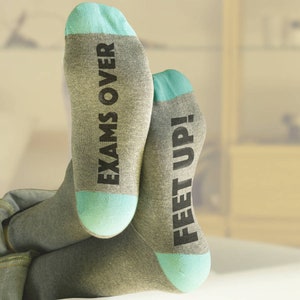 Exams Over Feet Up. Funny word socks for graduates and students