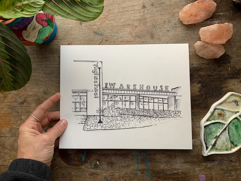May include: Black and white line drawing print of a building with the text "Warehouse" above the entrance and "High School" on the side.