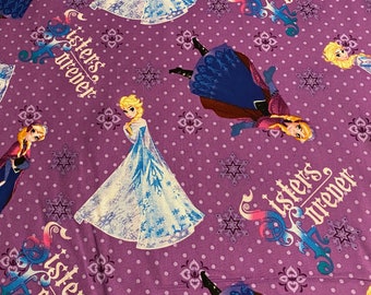 Disney Frozen “Sisters Forever” fabric by Springs