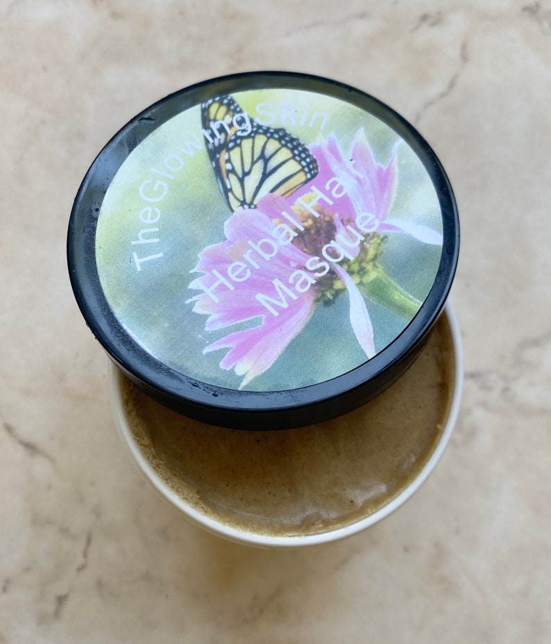 Hair conditioner with herbs and coconut oil for hair strengthening.