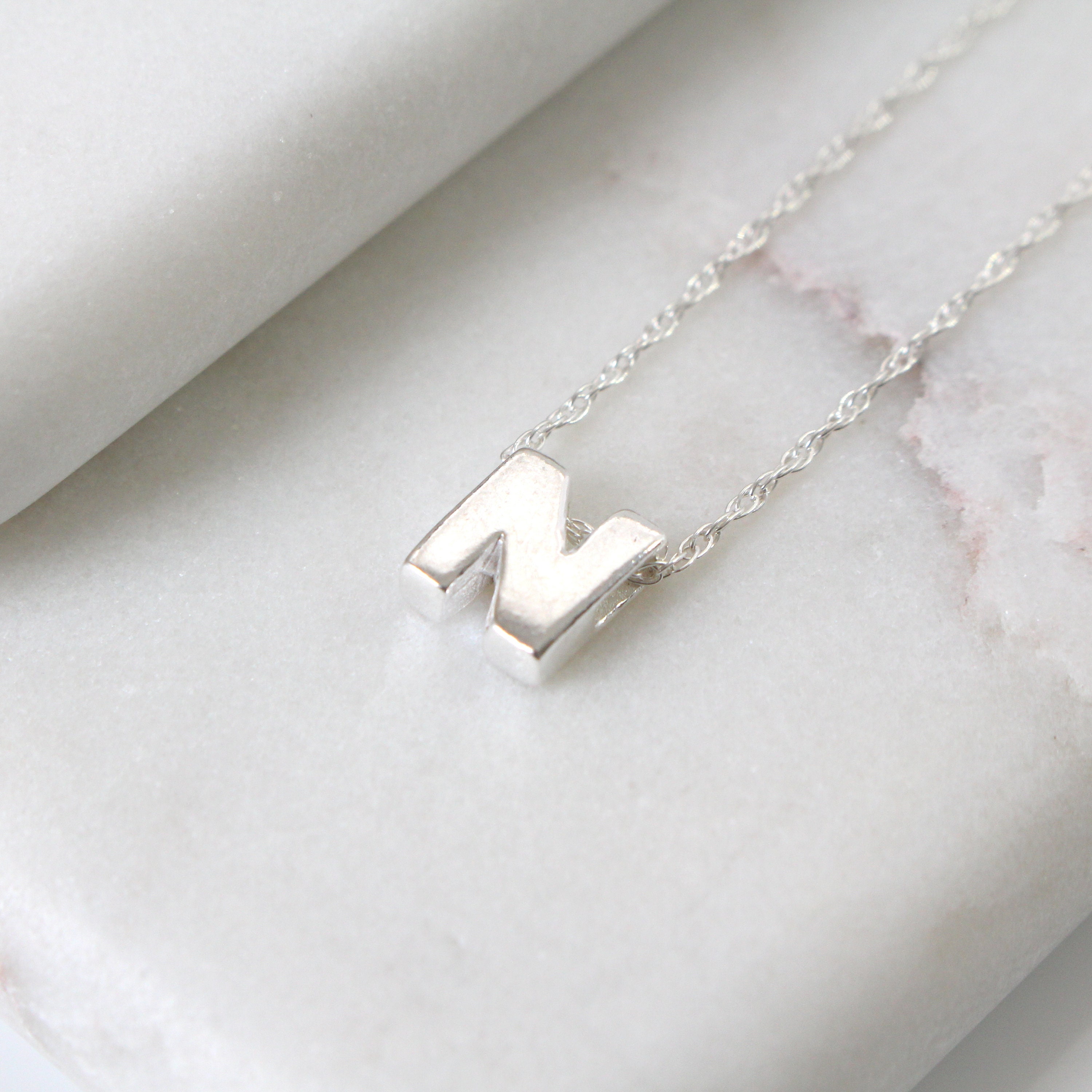 Silver n pendant online