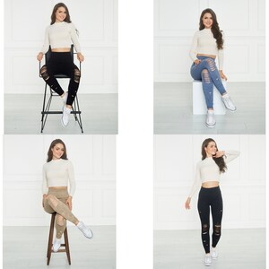 Puede incluir: Un top corto de manga larga en color crema combinado con leggings de cintura alta con aberturas horizontales desgastadas. Los leggings se muestran en negro, azul y beige, combinados con zapatillas blancas y un cuello alto ajustado.