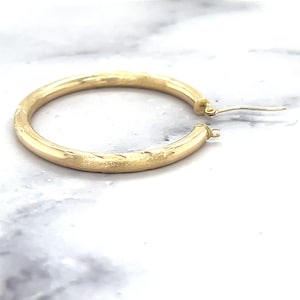 14K Yellow Gold Diamond Cut Textured Design Hoop Earring, side view