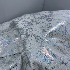 Metallic silver splash sparkle on white leather, nubuck glazed silver on white, fringe leather, metallic silver on white leather