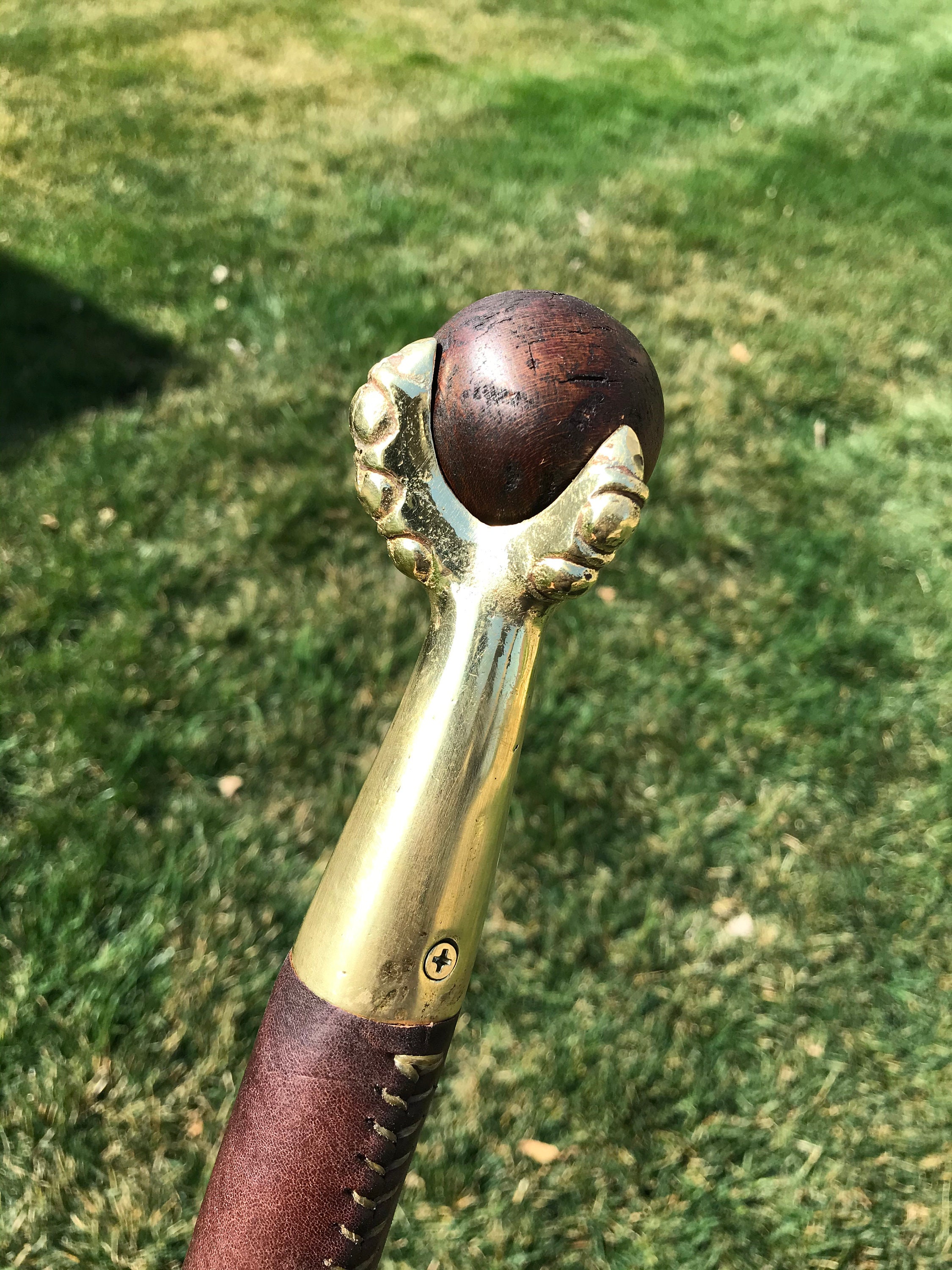Walking stick 542 Vintage brass claw & wood ball with leather grip on