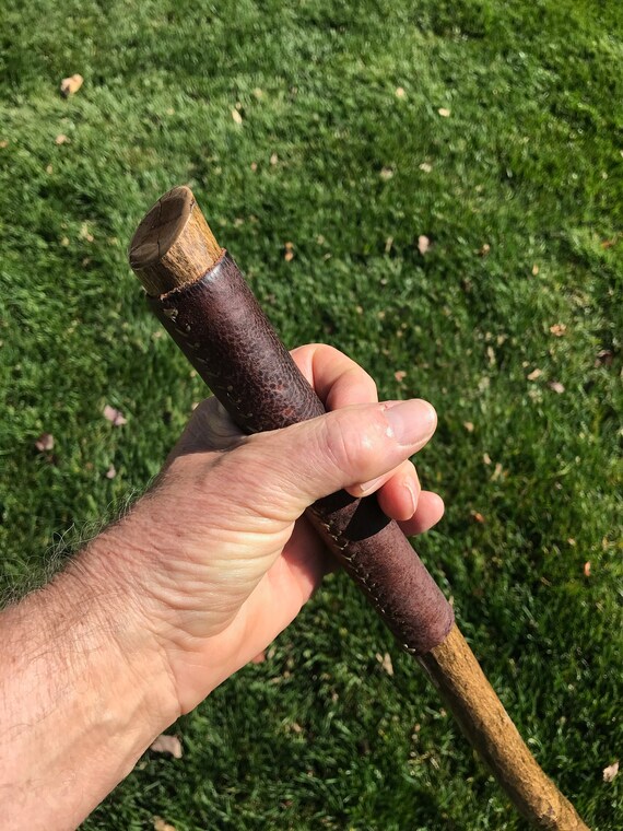 Walking stick 542 Vintage brass claw & wood ball with leather grip on