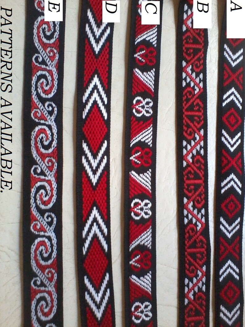 May include: Five different red, white, and black woven ribbon patterns labeled A through E.  The patterns are geometric and include swirls, arrows, and diamonds.