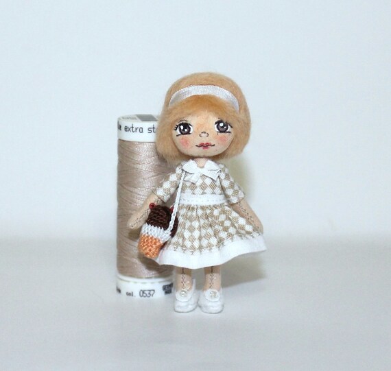 miniature cloth dolls