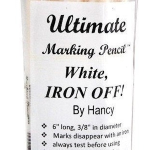 May include: White marking pencil labeled "Ultimate Marking Pencil™ White, IRON OFF! By Hancy". The pencil is 6 inches long and 3/8 inch in diameter. It is designed to disappear with an iron and can be sharpened with a crayon sharpener, knife, or sandpaper.