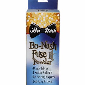 May include: A box of Bo-Nash Fuse It Powder, a powdered fusible for bonding fabric together instantly. The box is gold with a black bow tie and the text "Bo-Nash Fuse It Powder" in black and white. The box also says "Bonds fabric together instantly, No sewing required, Just iron & done, 2 oz. Powdered Fusible."