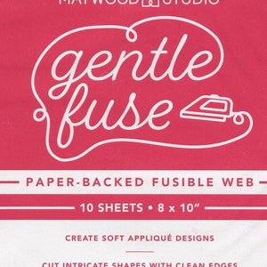 May include: A pink package of Maywood Studio Gentle Fuse paper-backed fusible web. The package contains 10 sheets, each measuring 8 by 10 inches. The package features the text "Gentle Fuse" in a white cursive font. The text "Paper-Backed Fusible Web" is also printed on the package in white. The package also includes the text "Create soft appliqué designs", "Cut intricate shapes with clean edges", "Permanent bond and no bubbling", "Leaves no residue on needles", "Retains a gentle hand", "Instructions on back", "Maywoodstudio.com", and "Made in China".