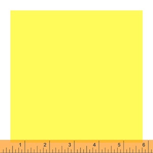 May include: A vibrant yellow square with a ruler at the bottom. The ruler displays measurements in inches, equivalent to approximately 2.5 to 15 cm. The square is a solid, bright yellow color.