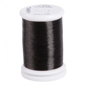 May include: A spool of dark brown nylon thread. The spool has a white top and base, with the brand name "AURIFIL" printed on the top. The label also indicates the thread is 100% nylon and made in Italy.