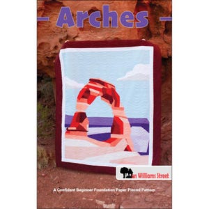 May include: A quilt with a landscape design of a red rock arch under a blue sky. The quilt has a white border and a maroon frame. The word "Arches" is at the top. The text "A Confident Beginner Foundation Paper Pieced Pattern" is at the bottom.