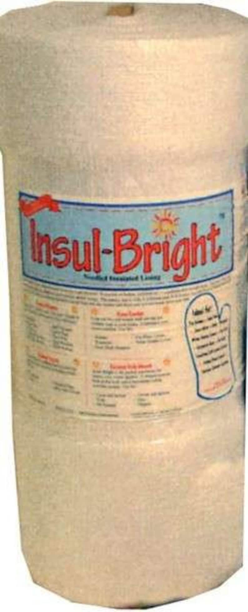 May include: A roll of Insul-Bright insulated lining material. The label features the text "Insul-Bright" in red letters on a blue background, with a sun graphic. A drawing of an oven mitt is also on the label.