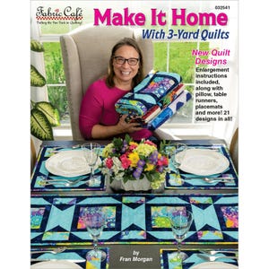 May include: A book titled "Make It Home with 3-Yard Quilts" by Fran Morgan. The cover features a woman holding three quilts in blue, green, and pink fabrics. The book includes new quilt designs, instructions for pillow, table runners, placemats, and more.