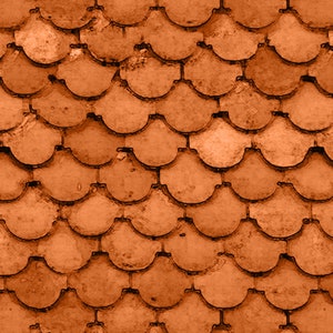May include: A close-up of a textured orange roof made of overlapping tiles.