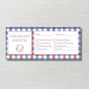 May include: A baseball-themed note card with a red, white, and blue plaid pattern. The card features the name "GRAHAM SMITH" and a baseball graphic. It includes fields for date, teacher, and checkboxes for various notes.