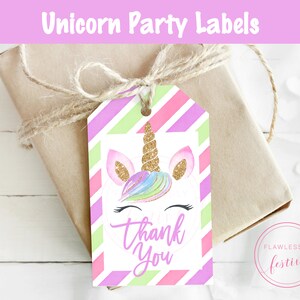 May include: A pink, green, and purple striped gift tag with a unicorn face and the text "Thank You".