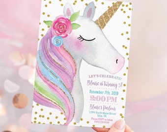 May include: A pink and blue watercolor unicorn with a gold glitter horn and flowers on its head. The unicorn is on a white background with gold glitter dots. The text on the invitation reads "Let's Celebrate! Blaire is turning 5! December 7th, 2019 2:00 PM Blaires Parlour 1234 South Main Street Tulsa, OK Please RSVP to Mom 555123.5555"
