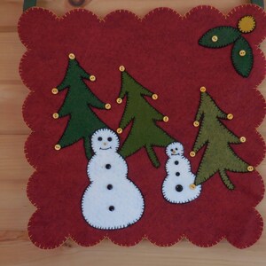Snowmen Amongst The Trees