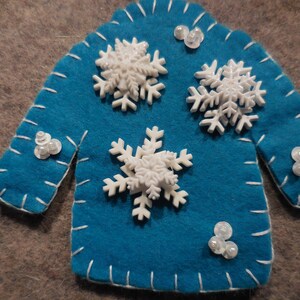 The Turquoise Snowflake Sweater Ornament
