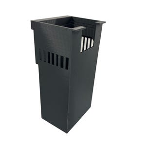May include: A black, rectangular planter with a tall, slender design. The planter features a series of vertical slits on the side and a rectangular opening at the top. The planter is made of a solid, matte material.