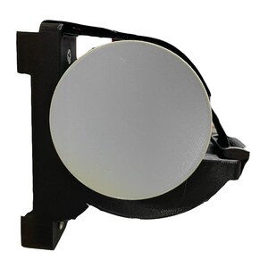 May include: A black plastic wall mount with a white round disc attached to it. The mount has a black strap wrapped around it.