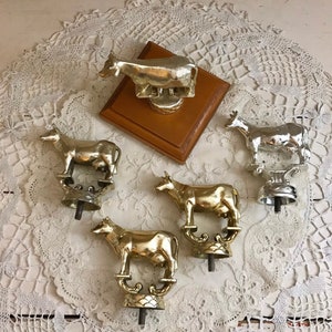 A Whole Herd of Vintage Metal Trophy Cows