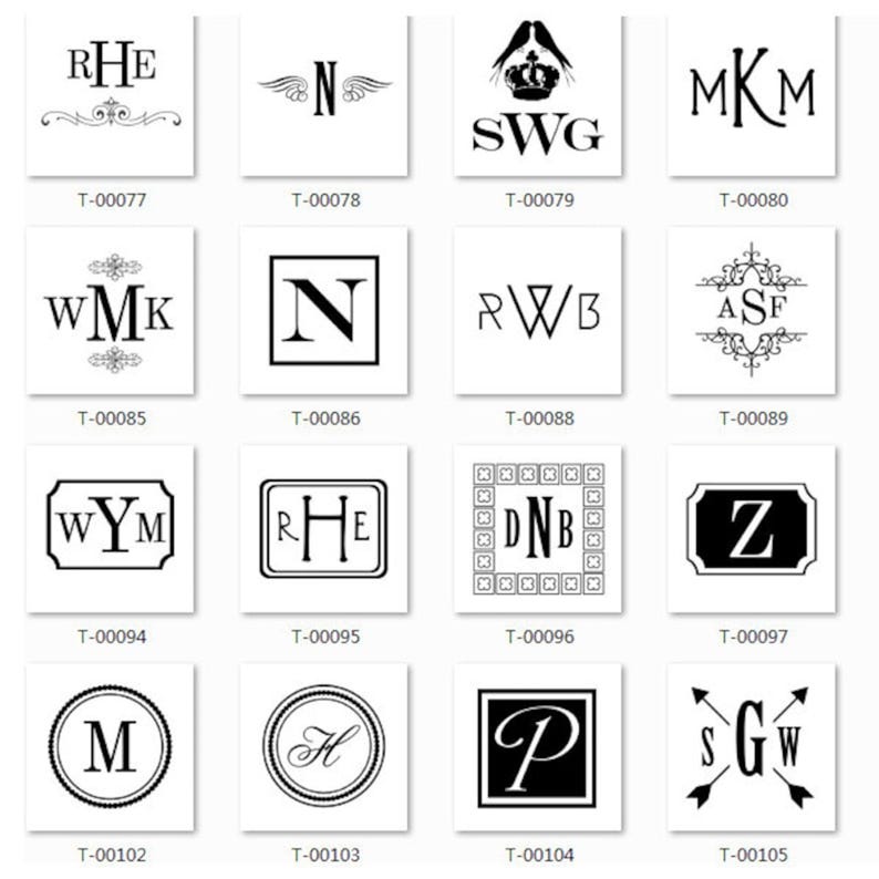 May include: A grid of 15 black and white monogram designs. Each design features a different combination of letters and decorative elements. The designs are arranged in a grid with a white background. The text below each design includes the letters and the product code.