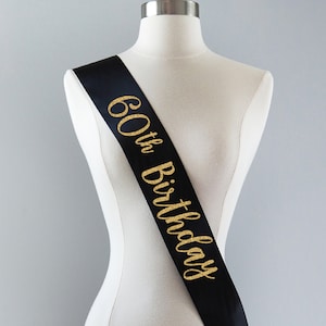60 and Sassy Sash Supplies and Decorations ADBetty 60th Birthday Sash 60 Birthday Gifts Party Favors White Sash with Gold Foil Lettering 