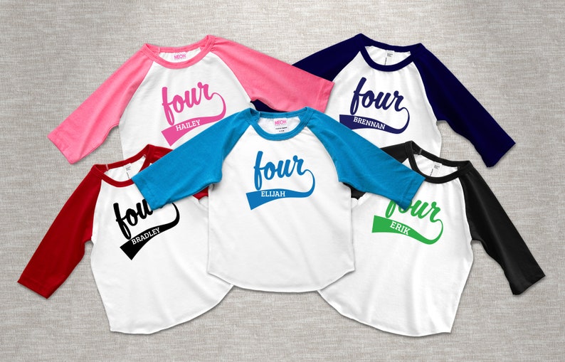 May include: Six white raglan baseball style shirts with different colored sleeves. Each shirt has the word "four" in a script font, with a name below. The sleeve colors are pink, navy, red, blue, black, and green.