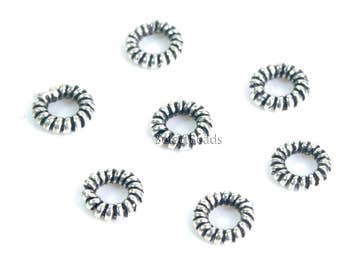 sterling silver coiled jump rings  - 925 genuine silver closed rings - 19 gauge  round jump ring - twisted ring findings for jewelry- 20 pcs